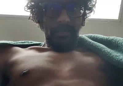 Masturbating