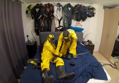 Vacuuming in tellchen hazmat suits