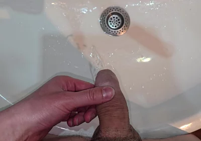 Pissing to the Bathroom Sink