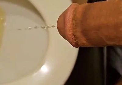 Shaved Cock Pissing