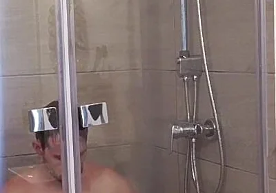 After a Full Day on the Road Wet Solo in the Hotel Shower
